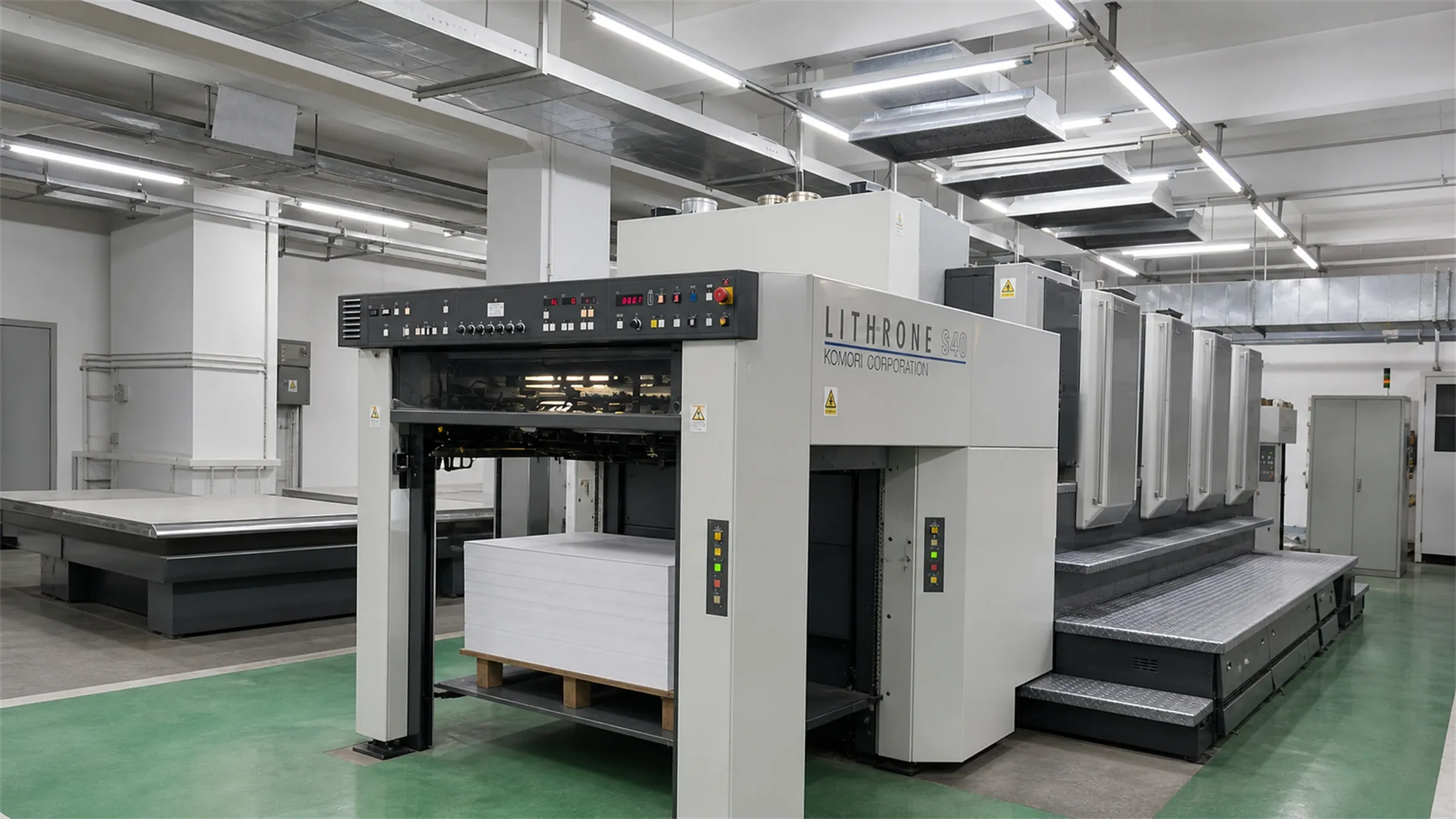Komori Lithrone offset press running production