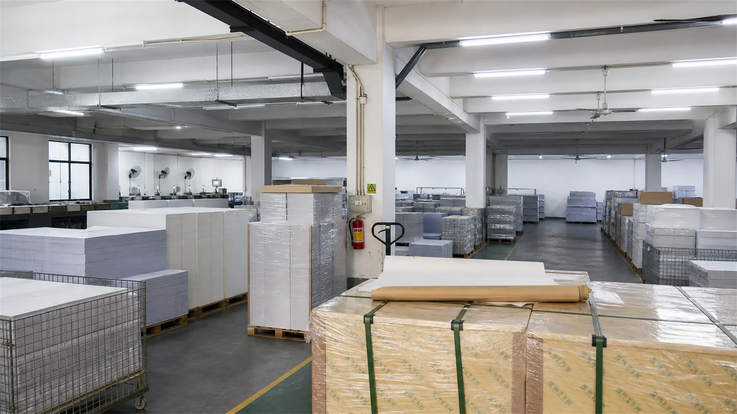 Warehouse with palletized printed goods staged for outbound shipping